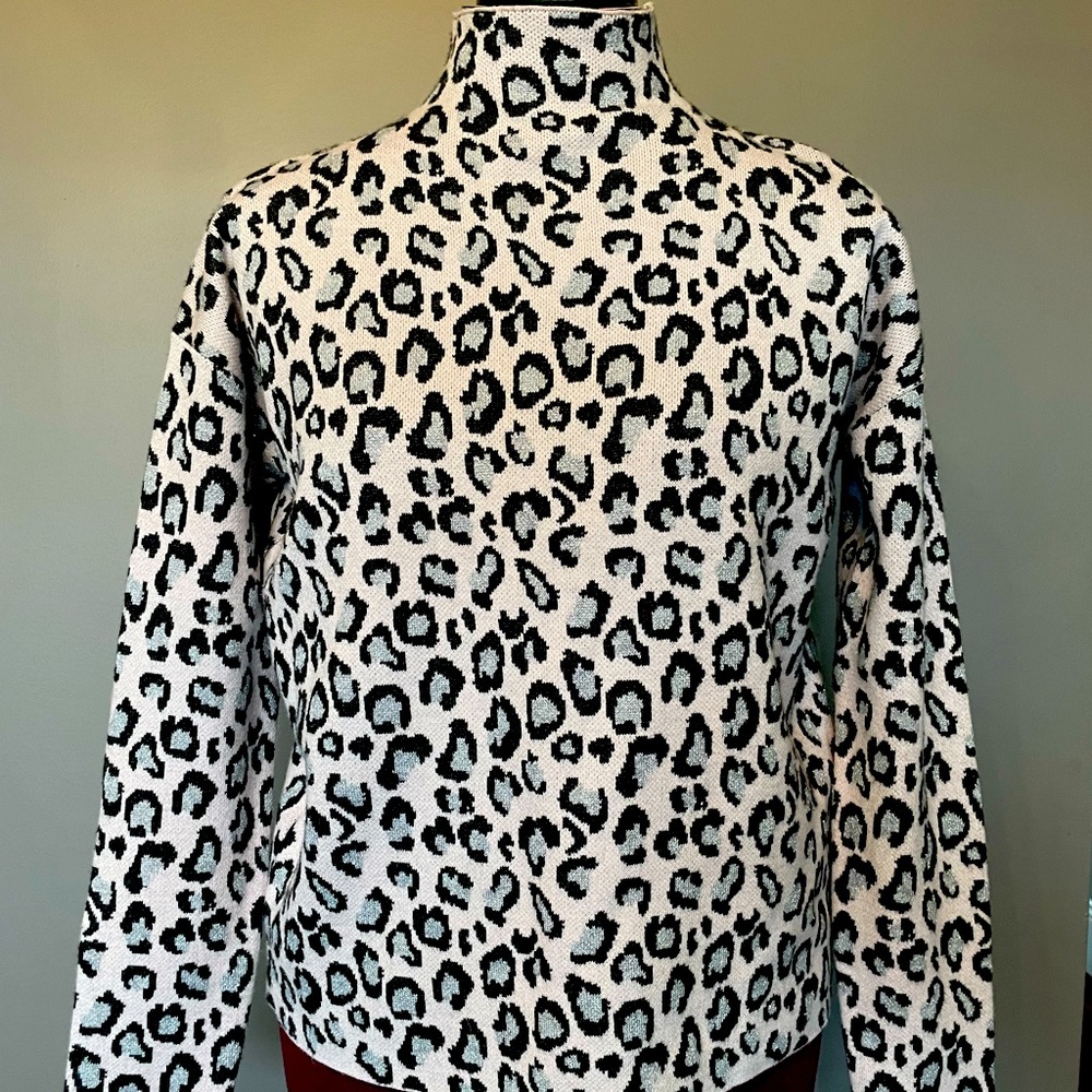 Pink leopard turtleneck sweater
